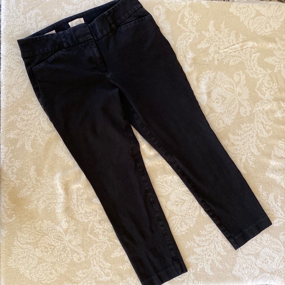 Black Loft cropped skinny pants.